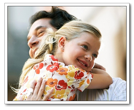 Daughter Hugging Father 